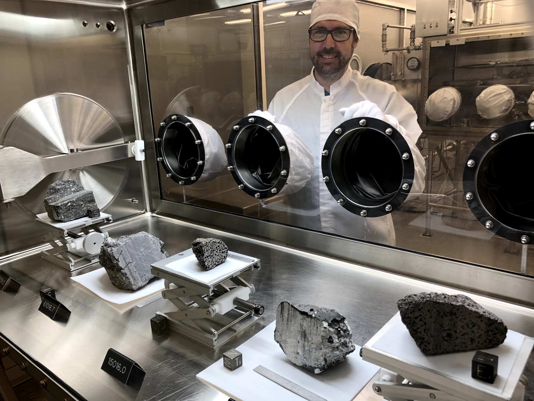 Visiting the astromaterials laboratory at JSC. Apollo samples are in the cabinet in front of me.