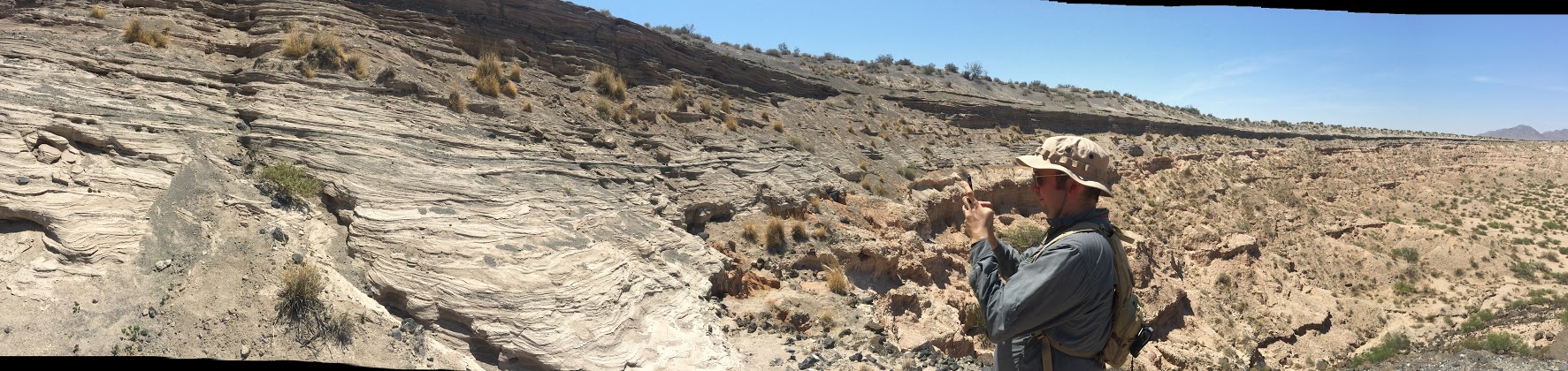 Dr. Noah Petro inspecting ash deposits at Kilbourne Hole