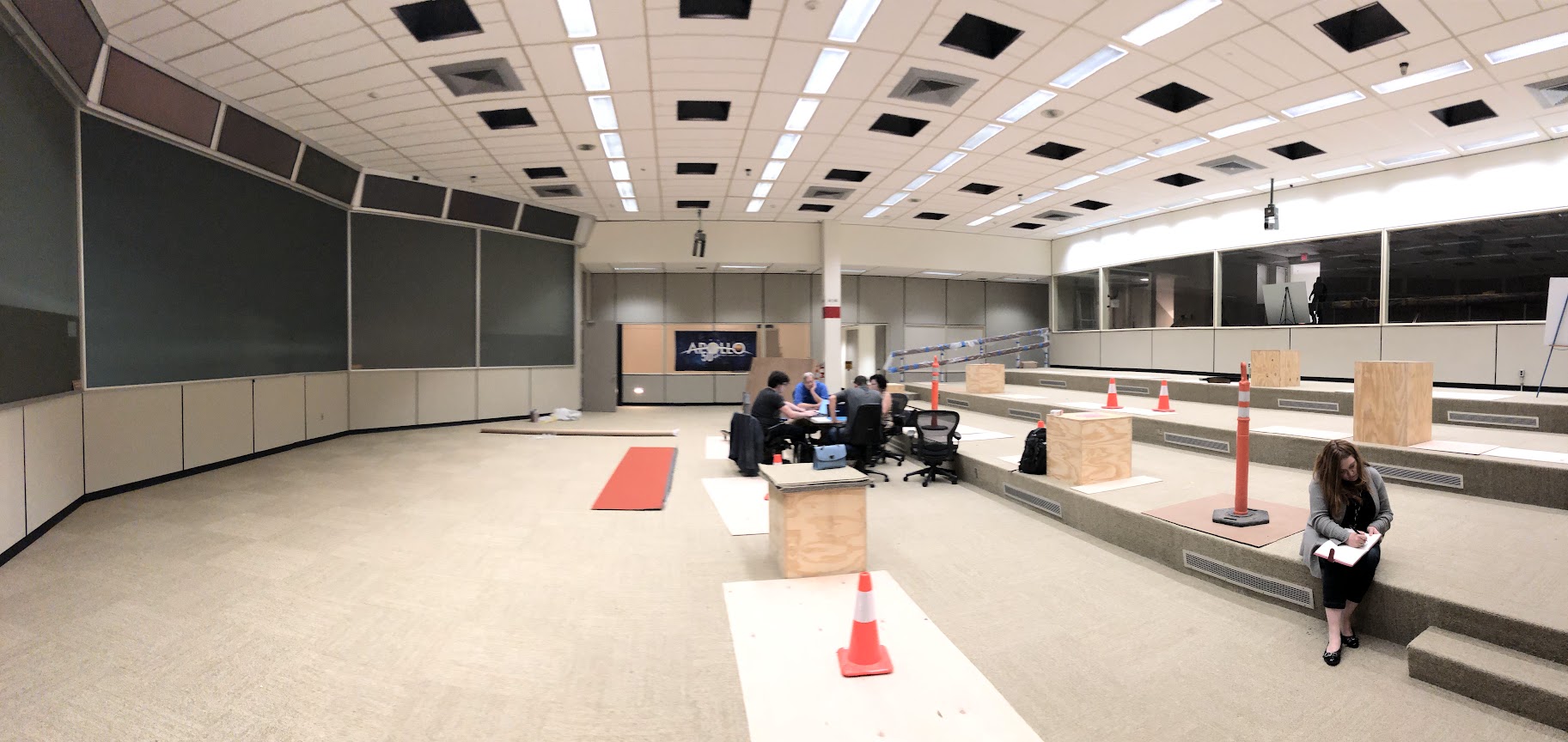 The team working on the visitor experience while the consoles were out for restoration